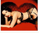 Photo of pinup girl and burlesque performer Dita Von Teese, 